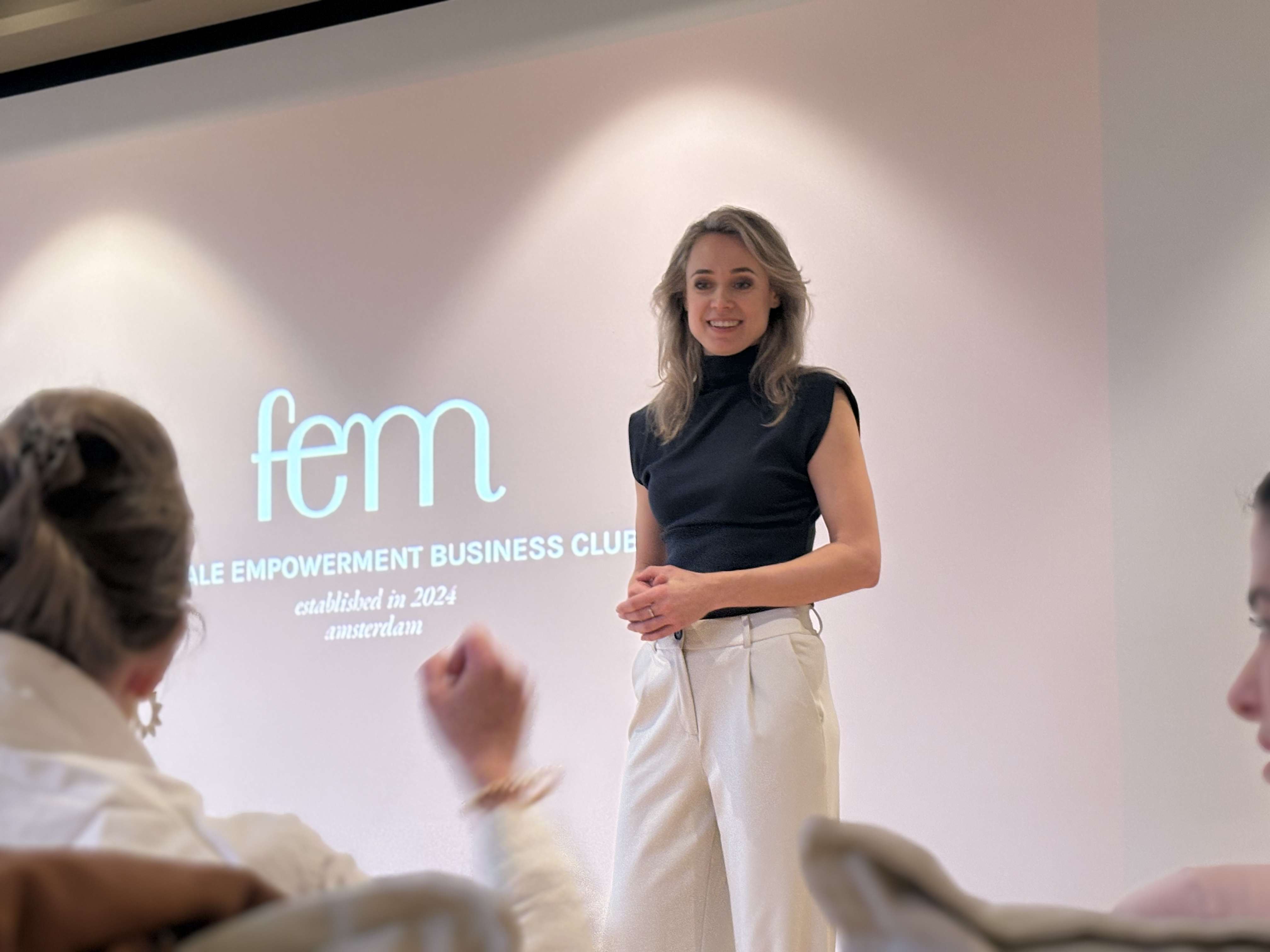 Speaker presenting at FEM Business Club